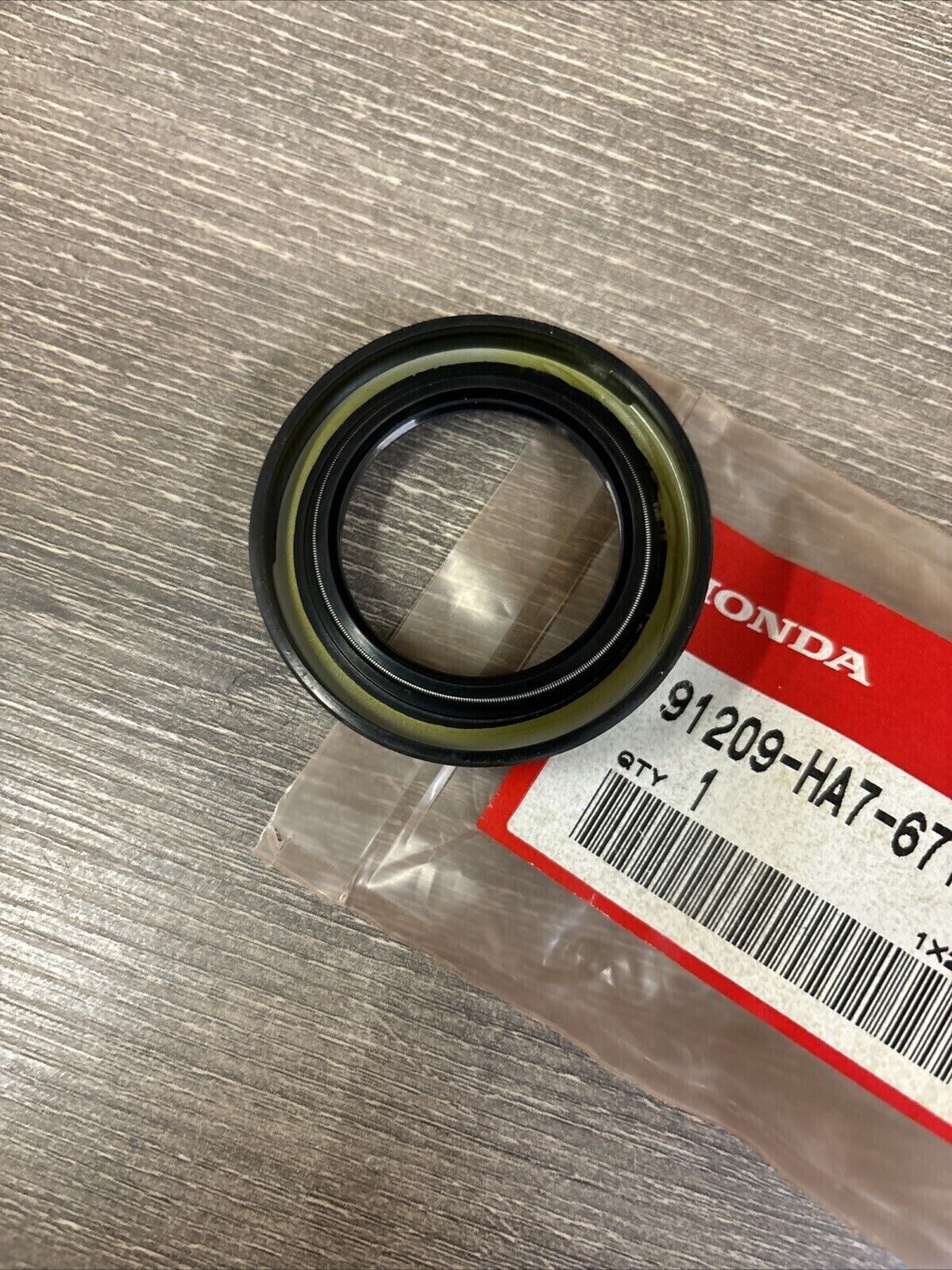 NOS Honda 1986 TRX350 DUST SEAL 36X56X7 91209-HA7-671 H128
