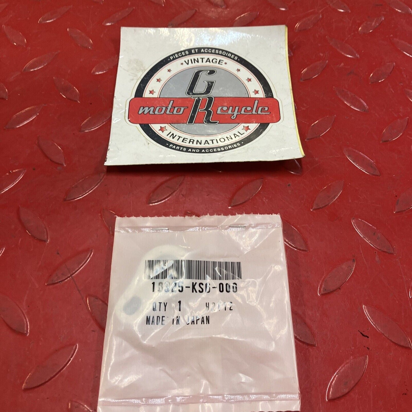 NEW Honda CR125R CR250R CR500 EXHAUST PIPE STAY BRACKET HANGER 18325-KS6-000 H99