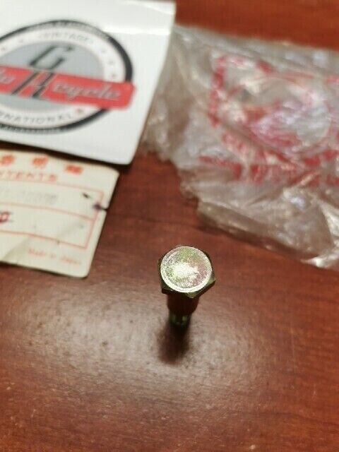 NOS Honda ANF125 C100 C50 C70 C90 CA125 BRAKE STOPPER BOLT A 92811-10000 H71