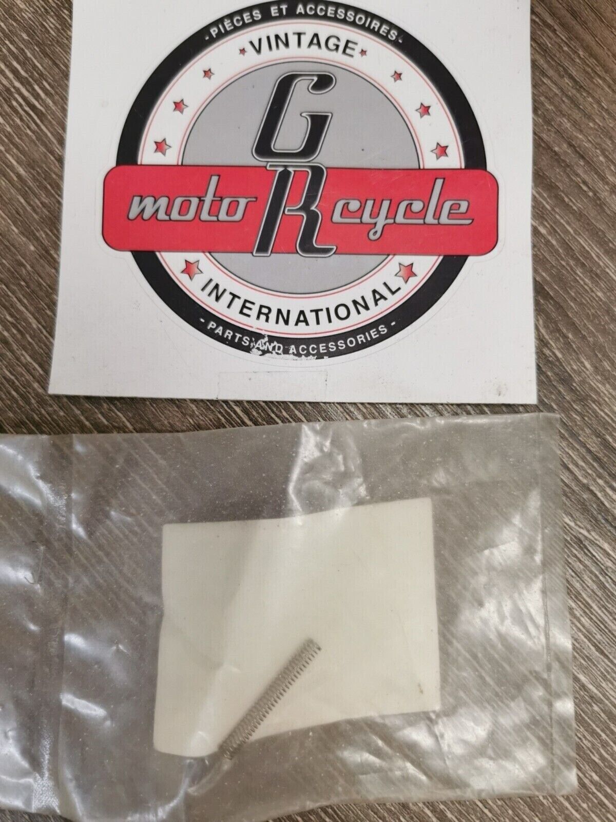 NOS HONDA SPRING  STARTER CLUTCH ROLLER 28125-323-000 H59