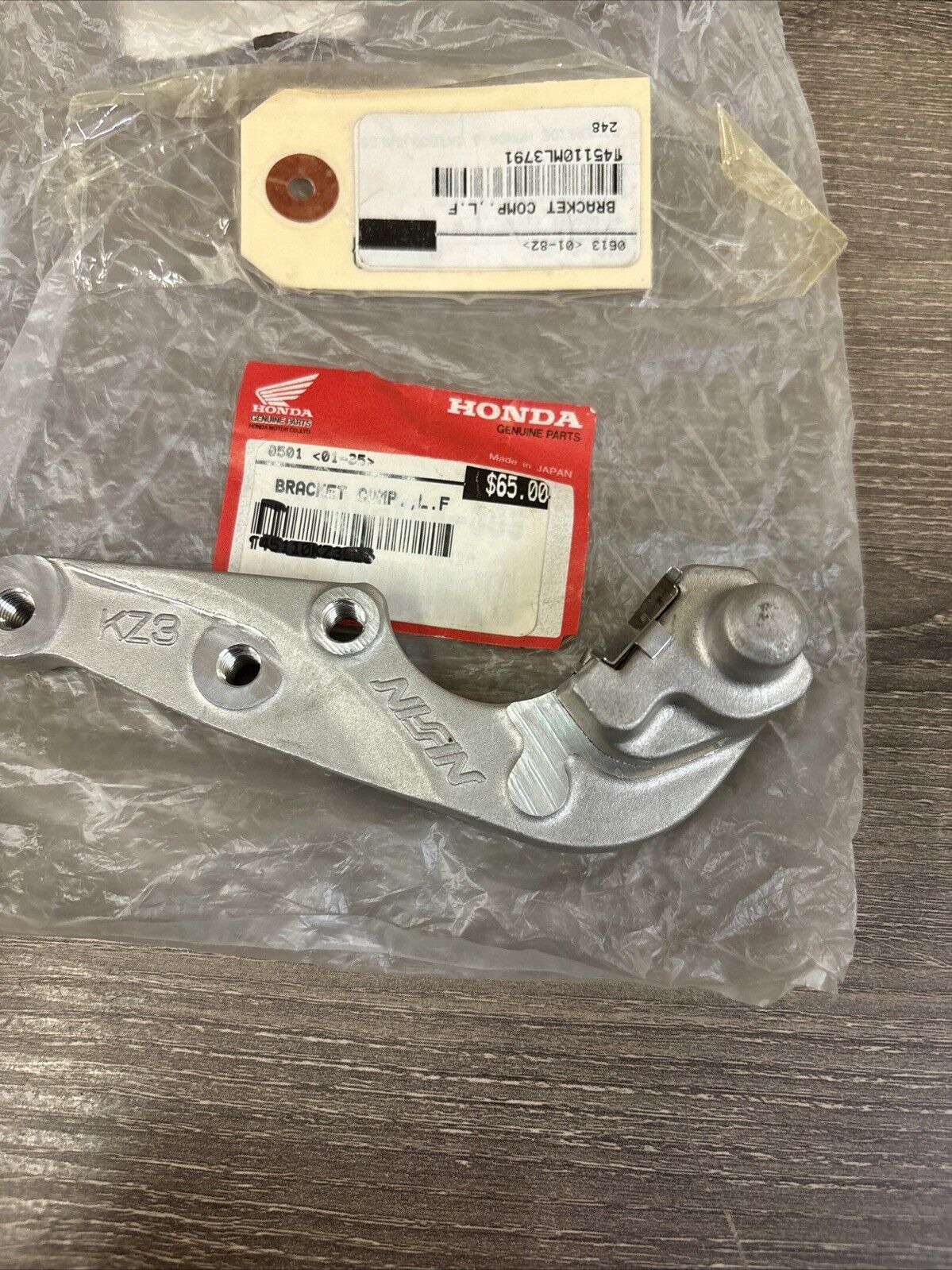 NOS Honda CR125R CR250R CR500R LEFT FRONT BRACKET 45110-KZ3-026 H120