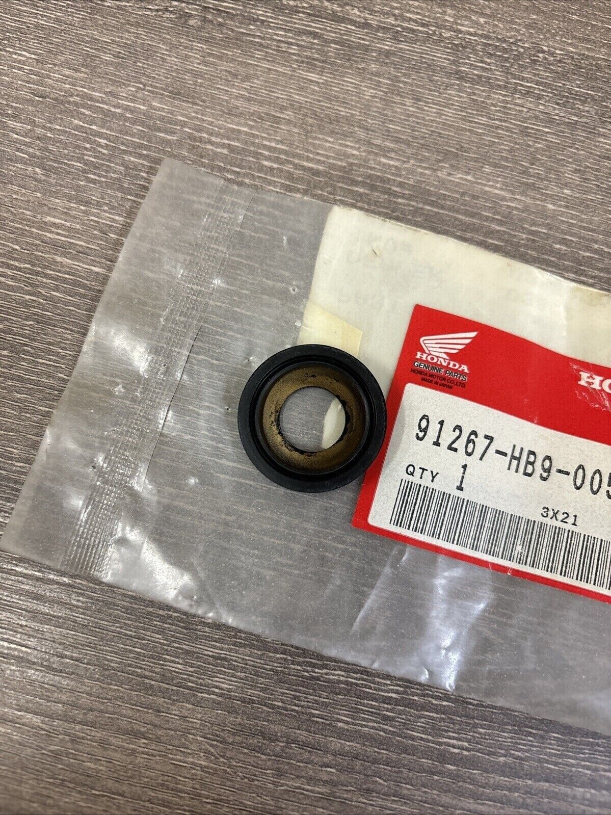 NOS Honda 1986 - 1989 TRX250 R SHOCK CONNECTING ROD SEAL B 91267-HB9-005 H126
