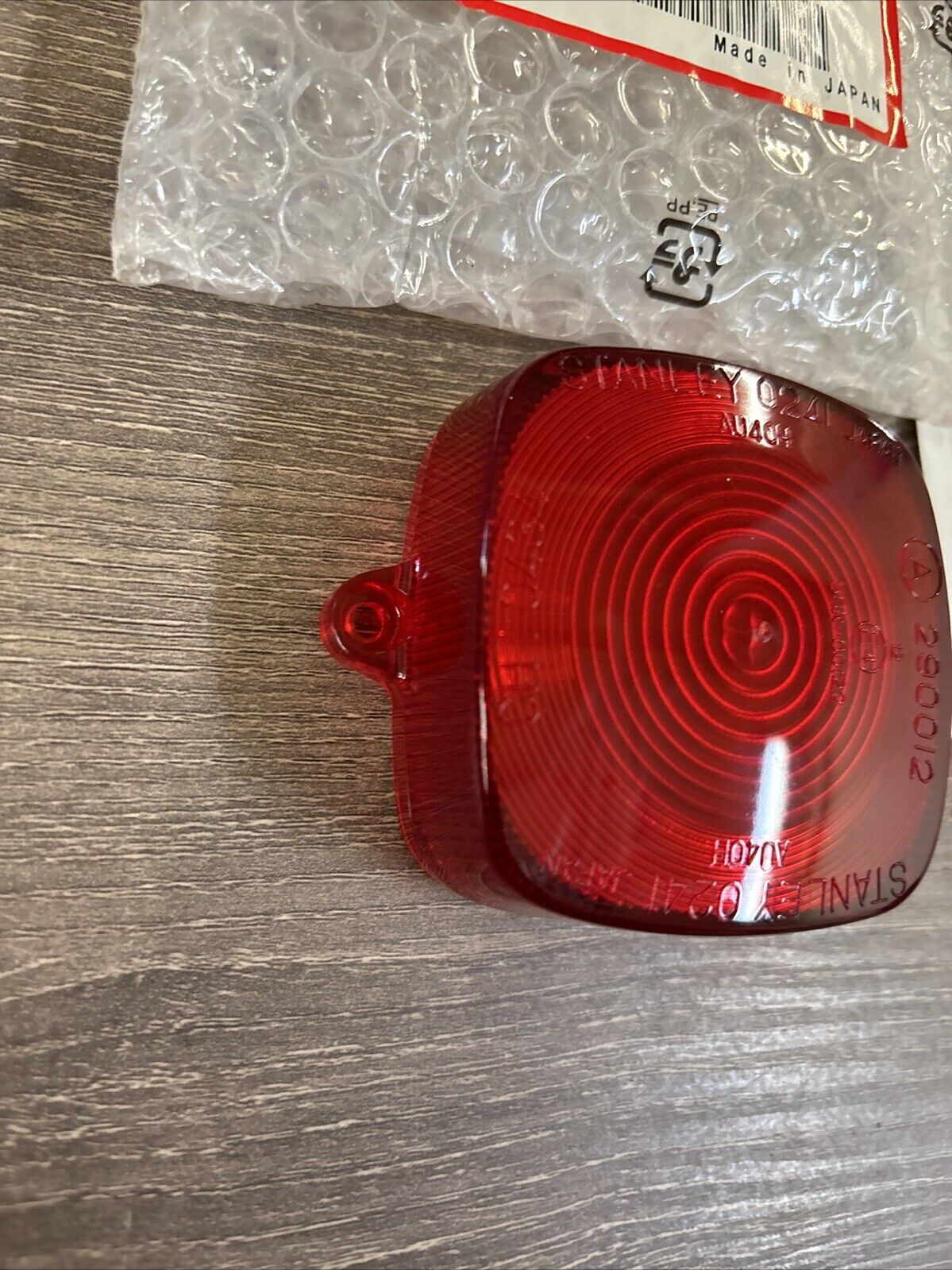NOS Honda TRX200 TRX250 TRX300 TRX450 STOP LIGHT LENS 33812-HF1-830 H116