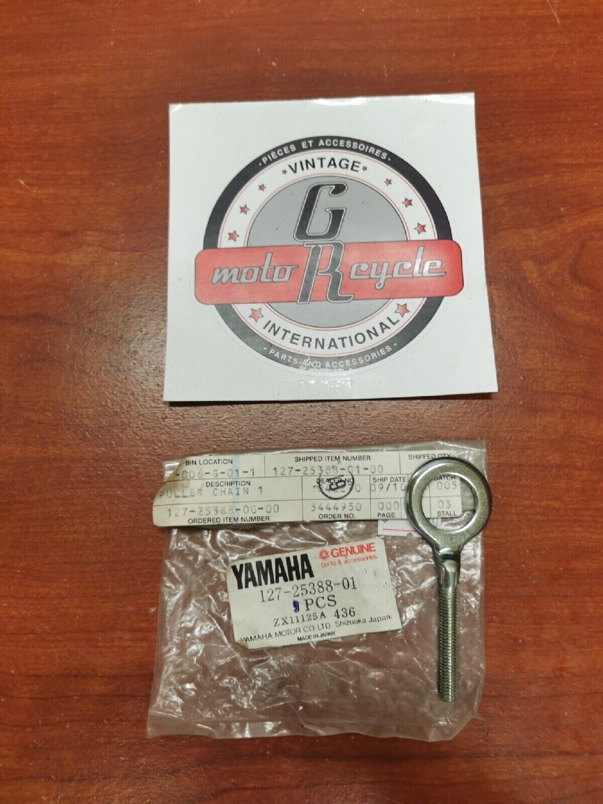 NOS Yamaha REAR WHEEL CHAIN PULLER 1 127-25388-01-00 Y69