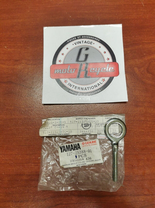 NOS Yamaha REAR WHEEL CHAIN PULLER 1 127-25388-01-00 Y69