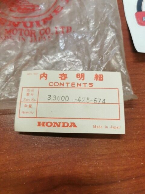 NOS Honda CB650 CB750 LEFT REAR TURN SIGNAL 33600-425-674 SUB 33600-425-679 H99