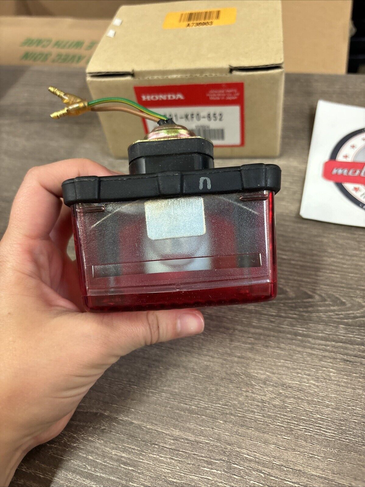 NOS Honda XR200R XR250R XR350R XR600R TAIL LIGHT UNIT 33701-KF0-652 H129