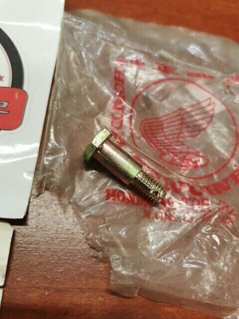 NOS Honda ANF125 C100 C50 C70 C90 CA125 BRAKE STOPPER BOLT A 92811-10000 H71