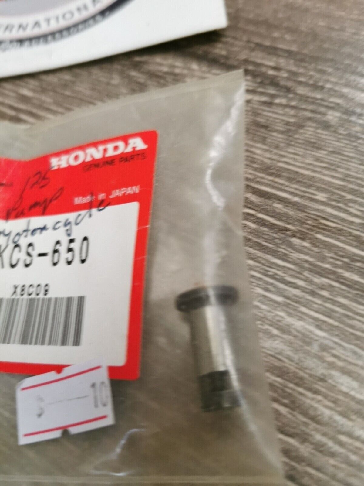 NOS HONDA CL100 OIL THROUGH  15441-KCS-650 H59