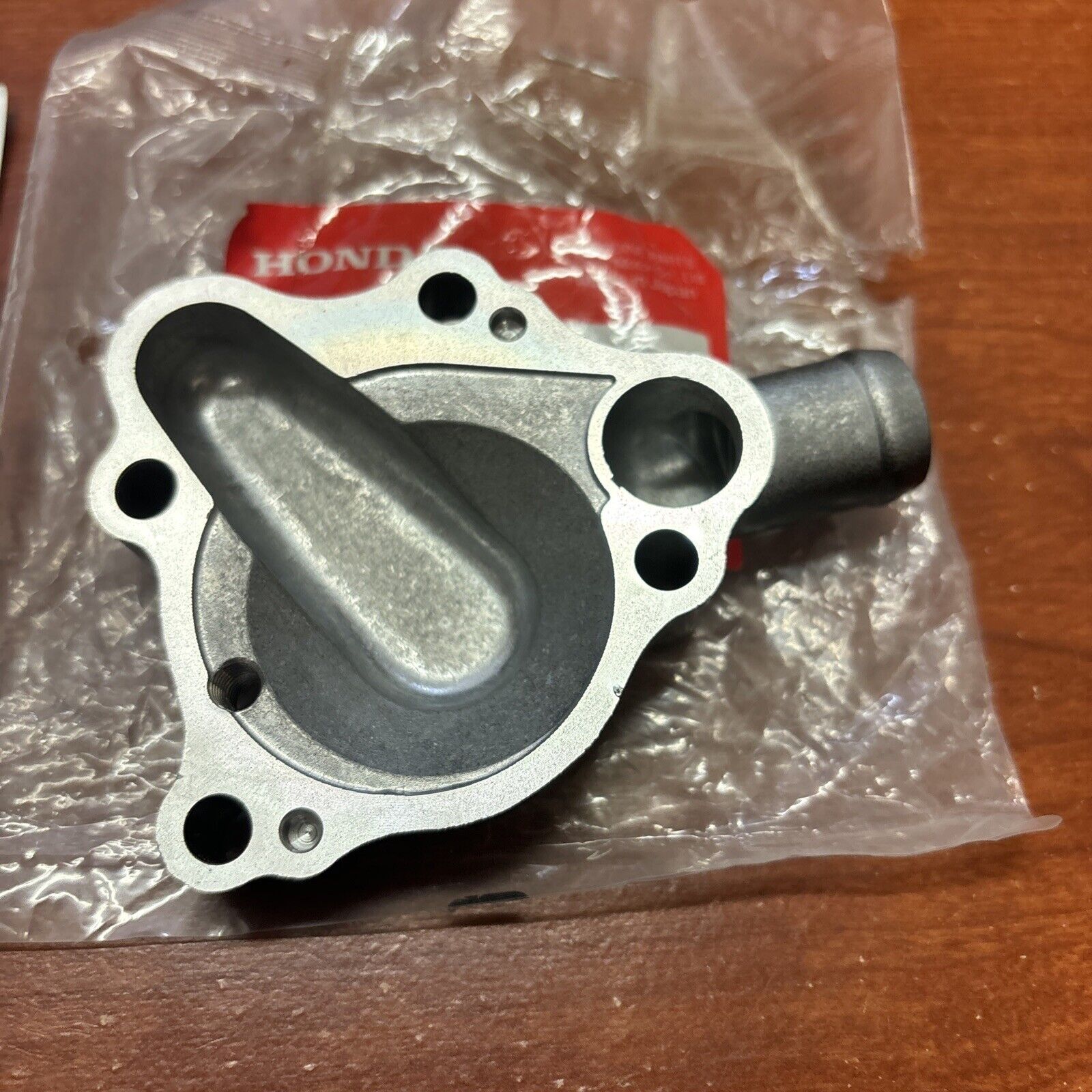 NOS Honda 1987 - 1994 CR125R WATER PUMP COVER 19221-KS6-700 H166