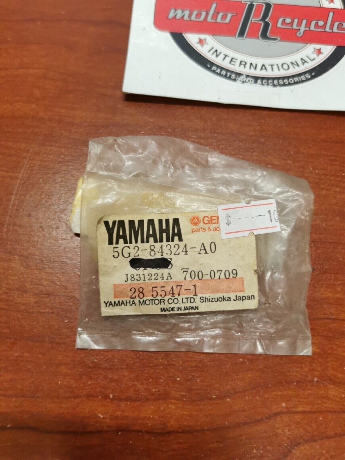 NOS Yamaha REFLECTOR SPRING 5G2-84324-A0-00 SUB. 55X-84124-00-00 Y68