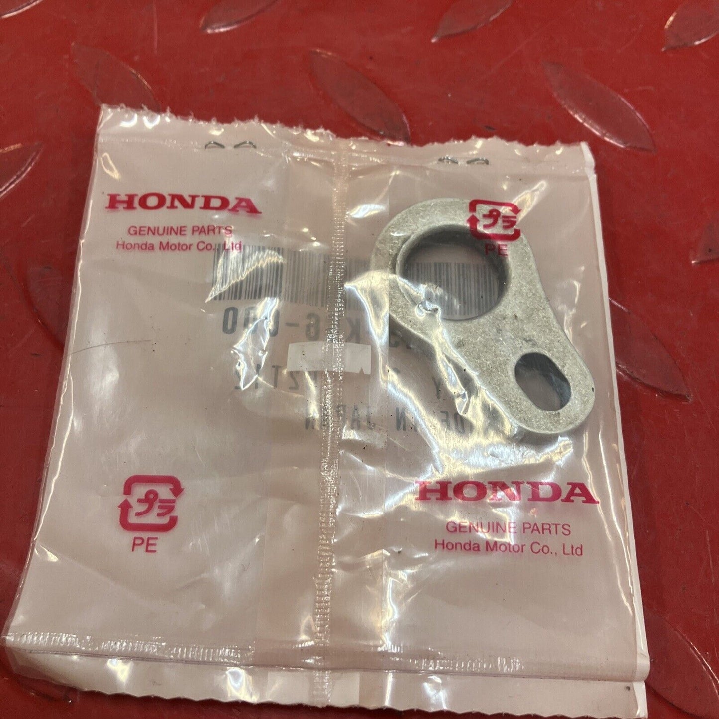 NEW Honda CR125R CR250R CR500 EXHAUST PIPE STAY BRACKET HANGER 18325-KS6-000 H99