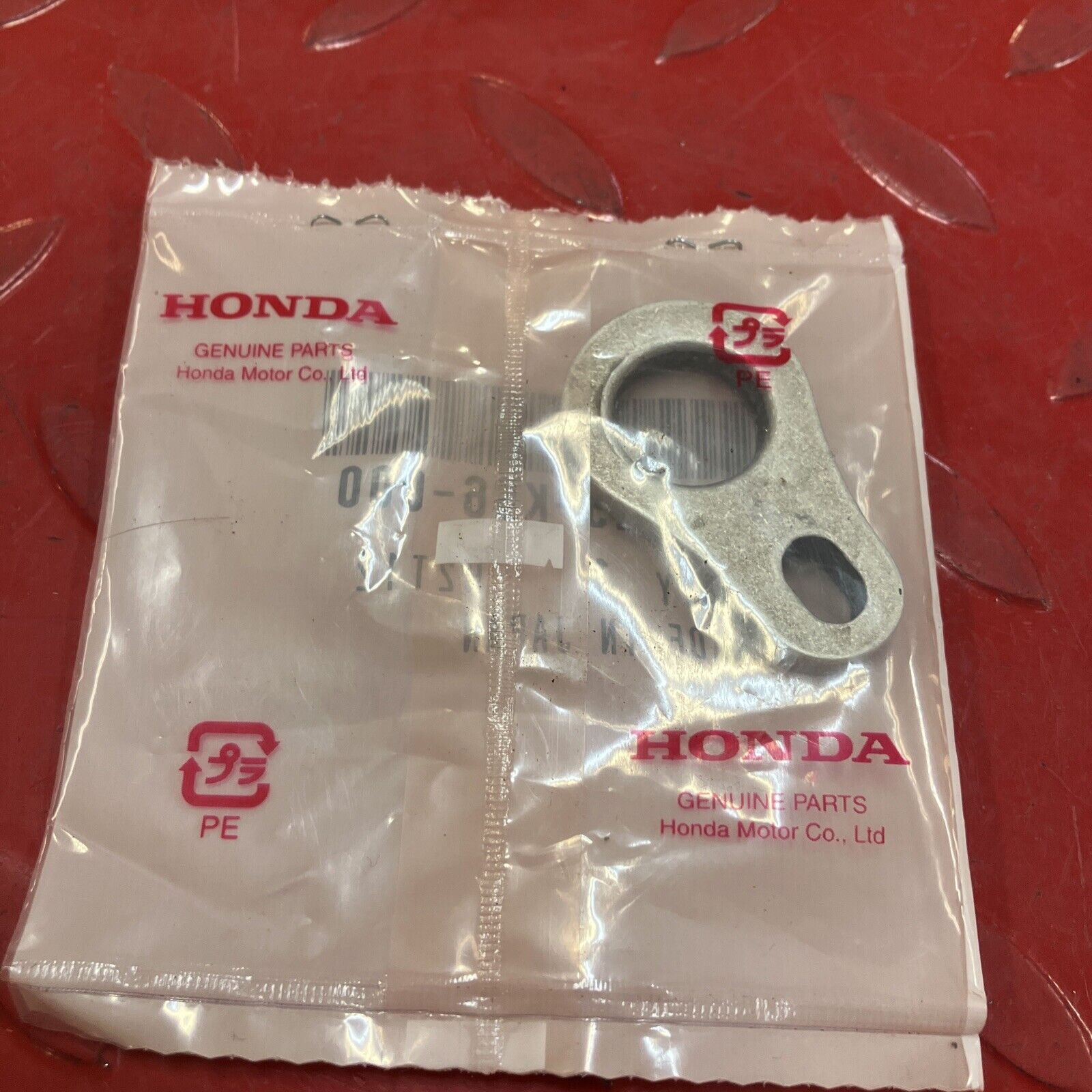 NEW Honda CR125R CR250R CR500 EXHAUST PIPE STAY BRACKET HANGER 18325-KS6-000 H99