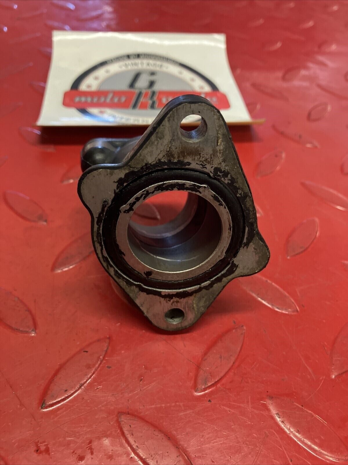 Honda XL200R 1984 Intake manifold carburetor insulator 1983