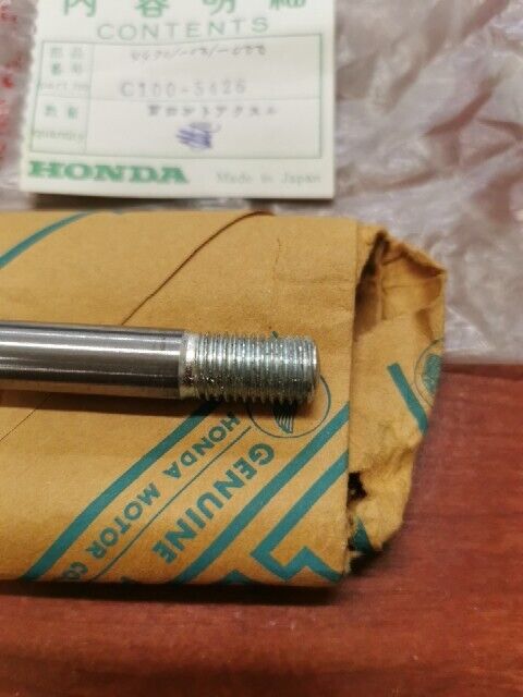 NOS Honda C100 FRONT WHEEL AXLE C100-5426 SUB. 44301-001-000 H68