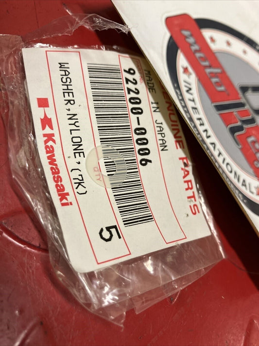 NOS KAWASAKI WASHER NYLONE 5.3x11.5x0.5 92200-0006 K13
