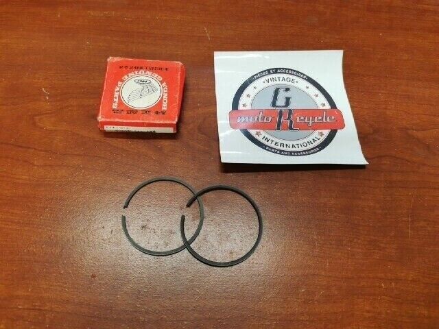 NOS Honda CR125M M1 PISTON RING SET 1.00 13015-360-003 SUB. 13015-360-004 H78