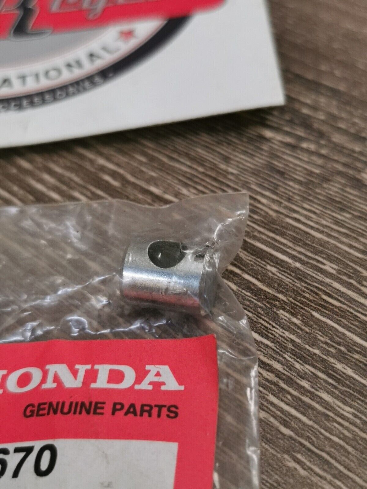 NOS HONDA BRAKE ARM JOINT 45453-148-670  H56