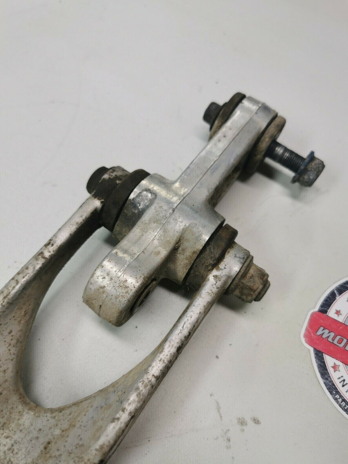 Suzuki RM125 1991 rear shock swingarm linkage dogbone cushion lever 62600-29810