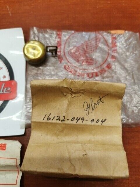 NOS Honda C310S C320S CB50M TS50 DX Z50M FLOAT *DAMAGED* 16122-049-004 H69