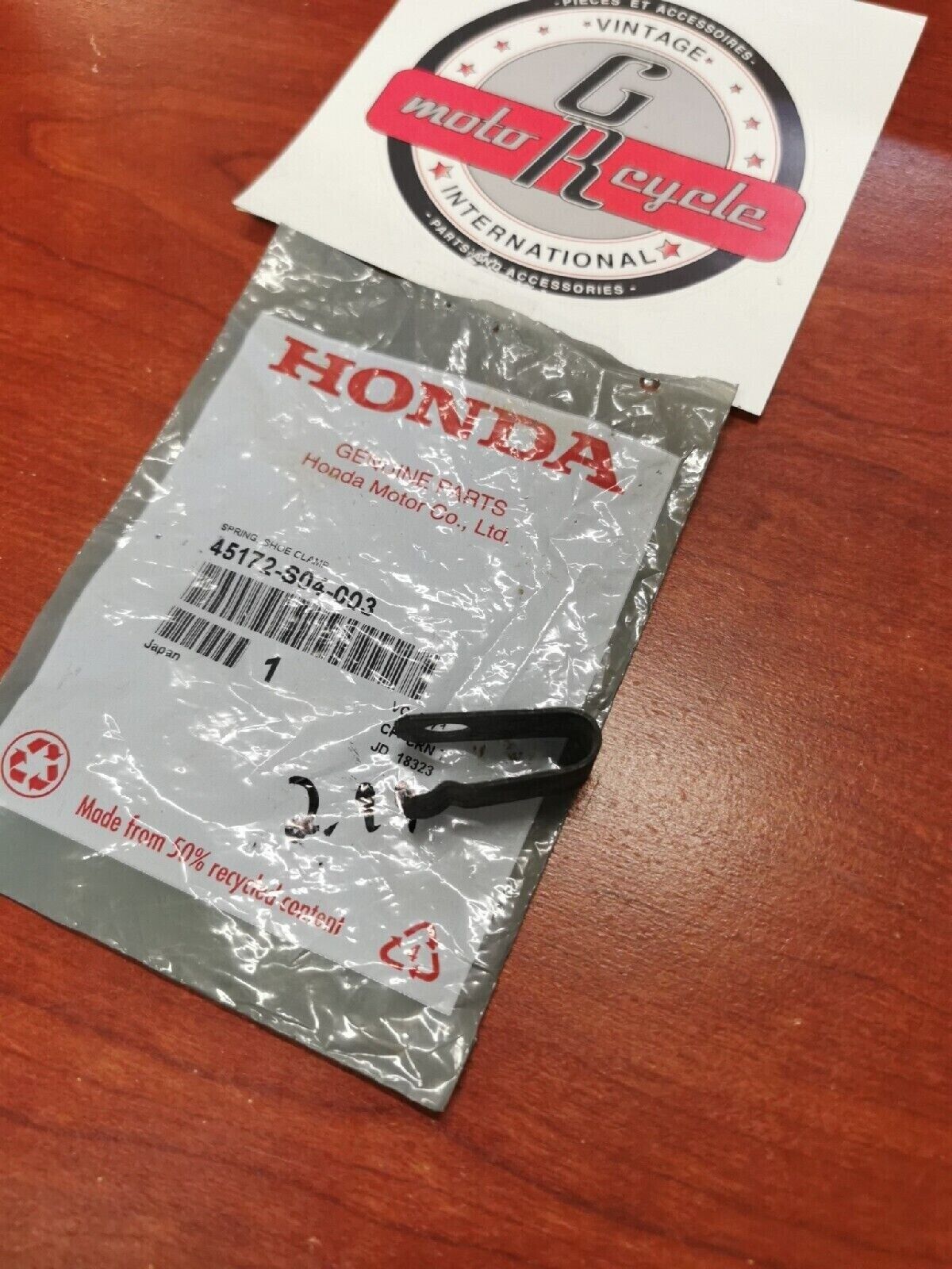 NOS Honda TRX350 TRX400 TRX300 SHOE CLAMP SPRING 45172-S04-003 H34
