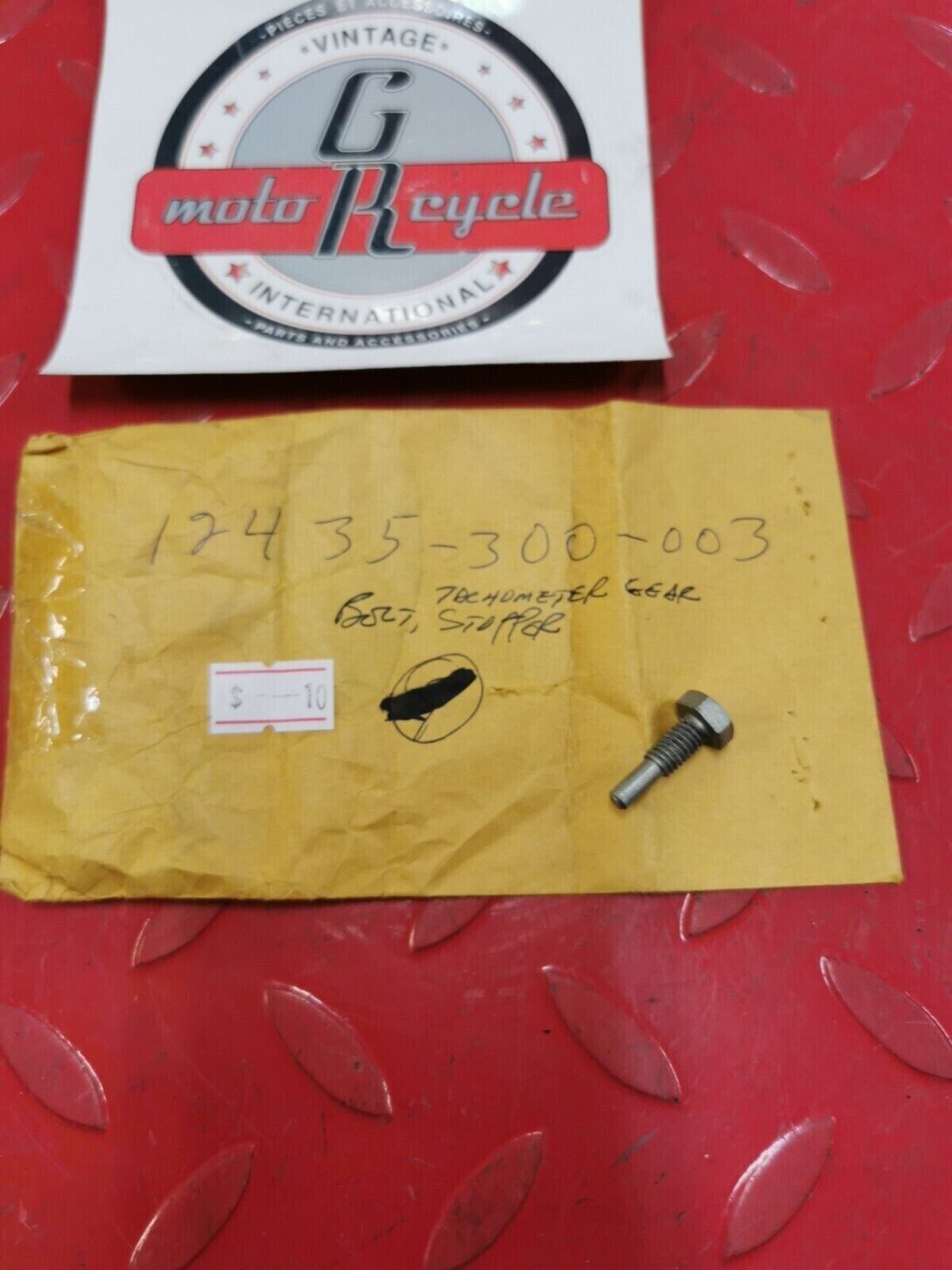 NOS Honda 1976 - 1978 CB750 BOLT, TACHOMETER GEAR STOPPER 12435-300-003 H32