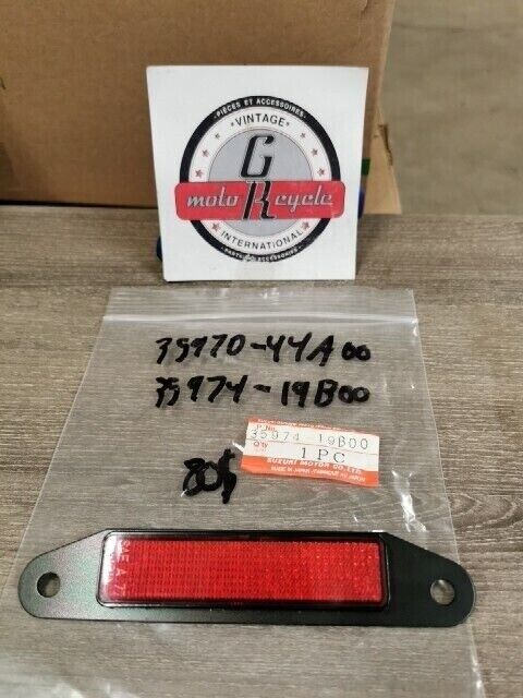 NOS SUZUKI LTF250 LTF4WDX LTF250 BRACKET REAR 35974-19B00 S41