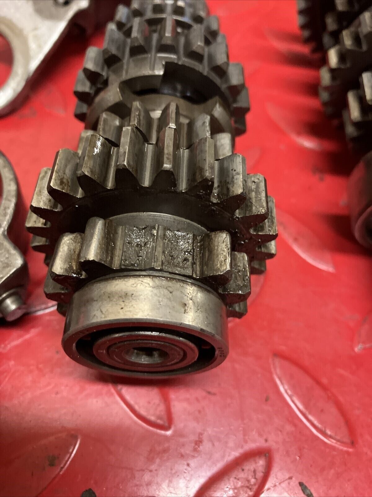 Suzuki TC125 1972 transmission shaft gear gearshift drum cam forks