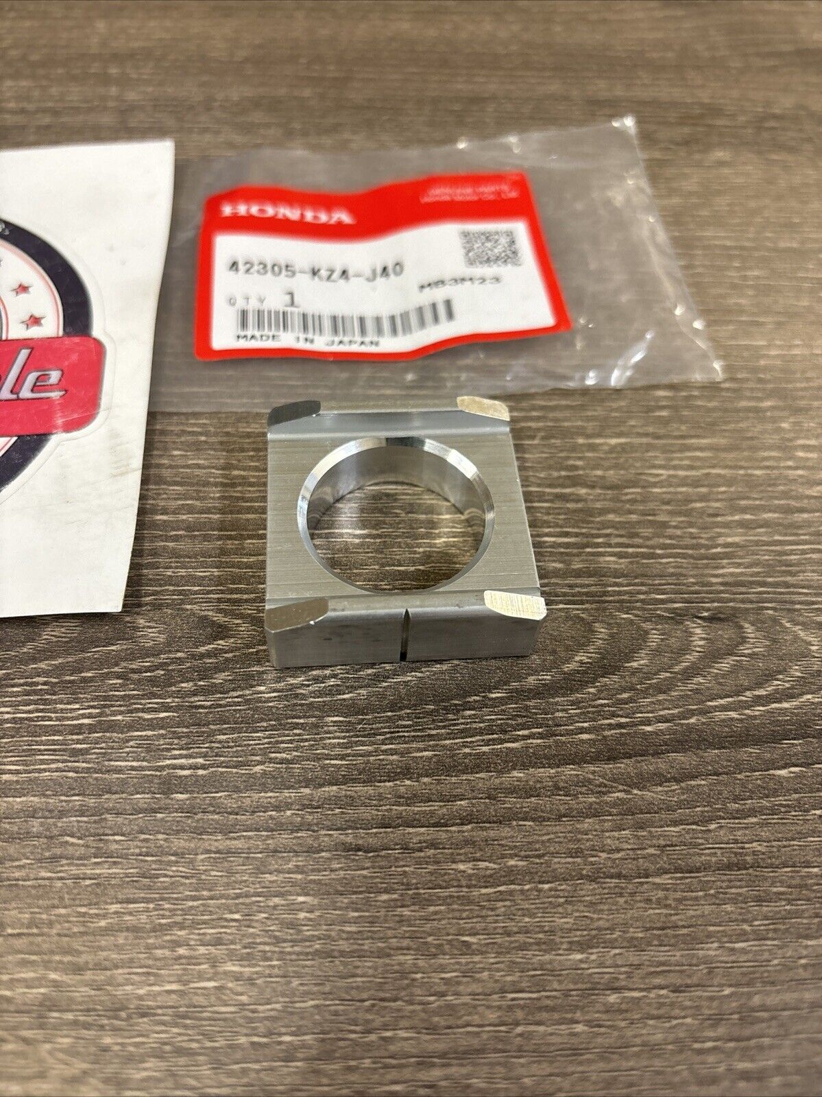 NOS Honda CR125R CR250R CRF250R CRF250X LEFT REAR AXLE COLLAR 42305-KZ4-J40 H138
