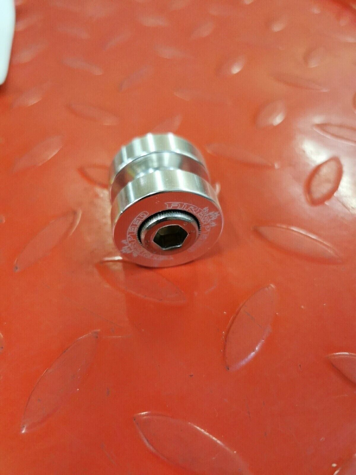 NOS FIRESPEED KAWASAKI  SWINGARM SPOOLS  SILVER 092053  J11