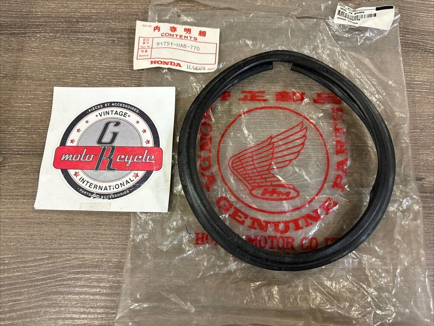NOS Honda 1987 TRX250 FRONT BRAKE SEAL 91751-HA8-770 H119