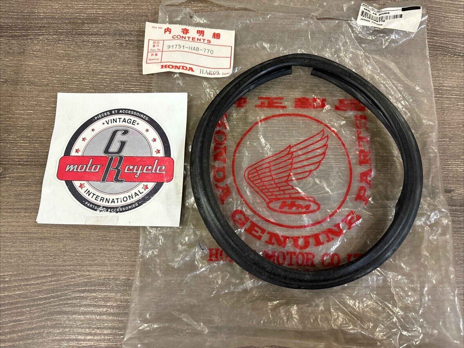 NOS Honda 1987 TRX250 FRONT BRAKE SEAL 91751-HA8-770 H119