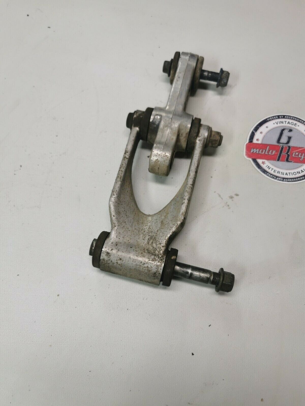 Suzuki RM125 1991 rear shock swingarm linkage dogbone cushion lever 62600-29810