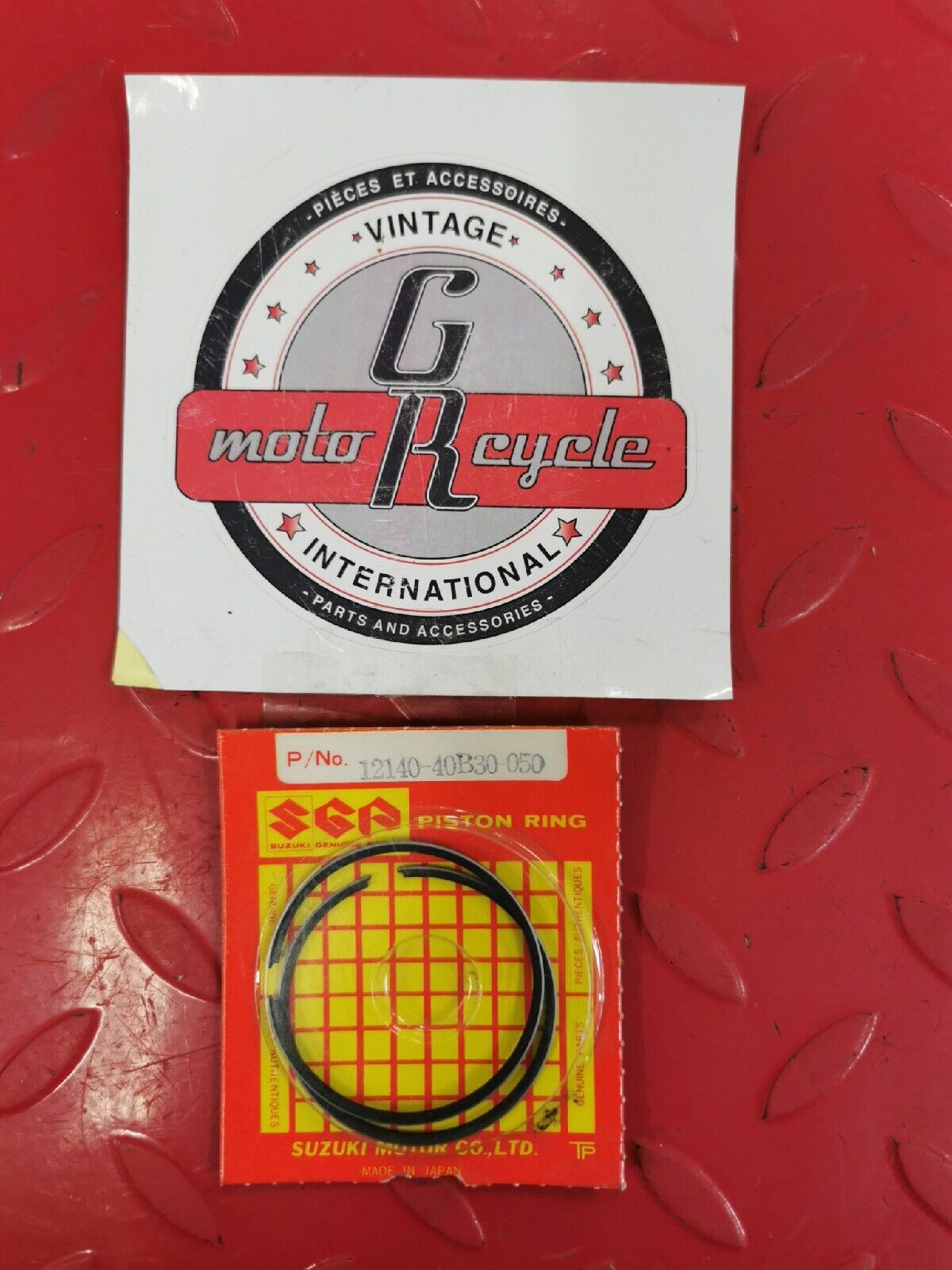 NOS SUZUKI LT80 2002 2003 2004 2005 2006 RING SET OS 0.5 12140-40B30-050 S11