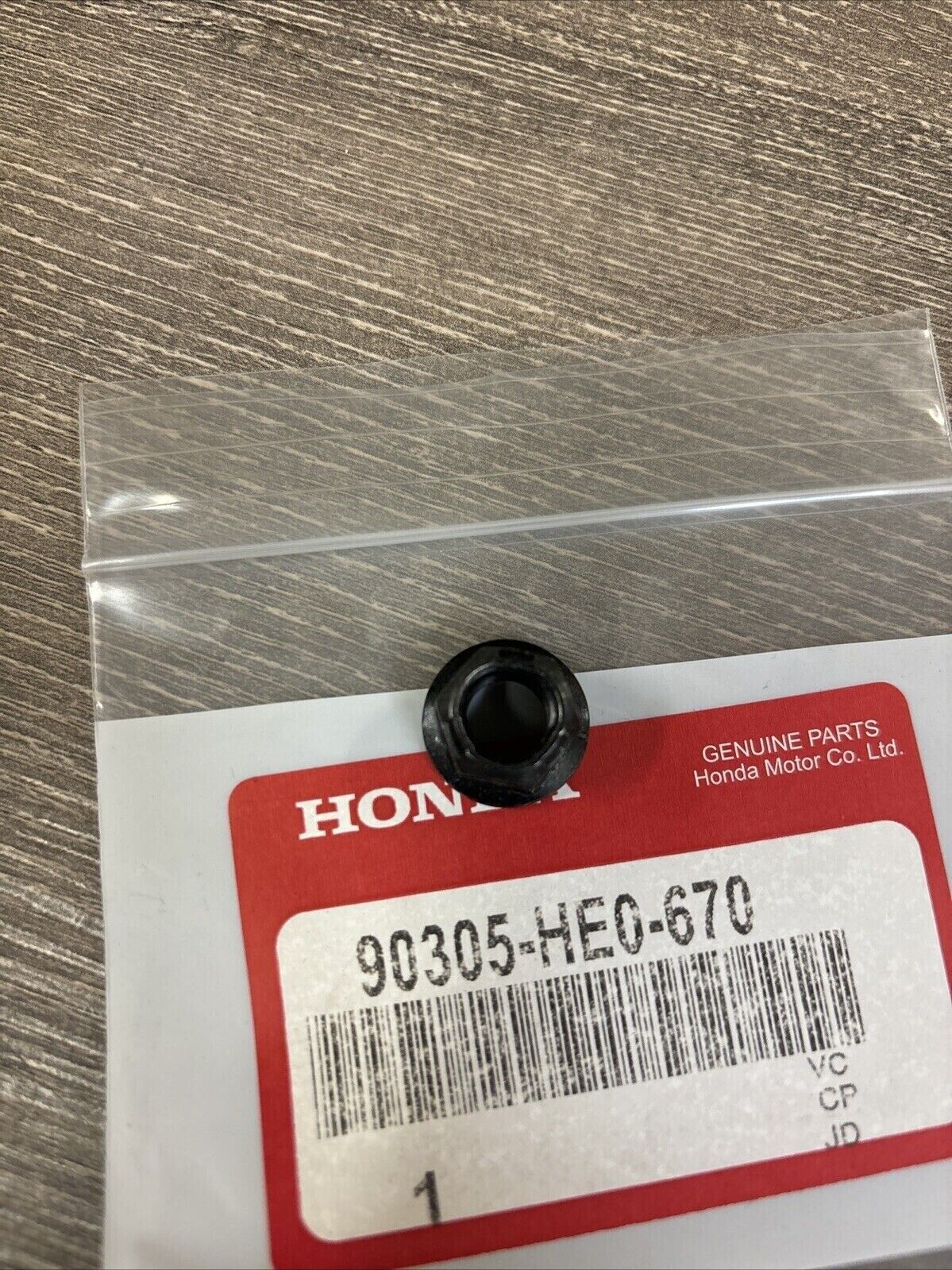 NOS Honda 1990 FL400R SELF-LOCK NUT 10MM 90305-HE0-670 H125