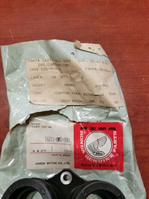 NOS Honda 1984 1985 XR200R CARBURETOR INSULATOR 16211-KK0-000 H107