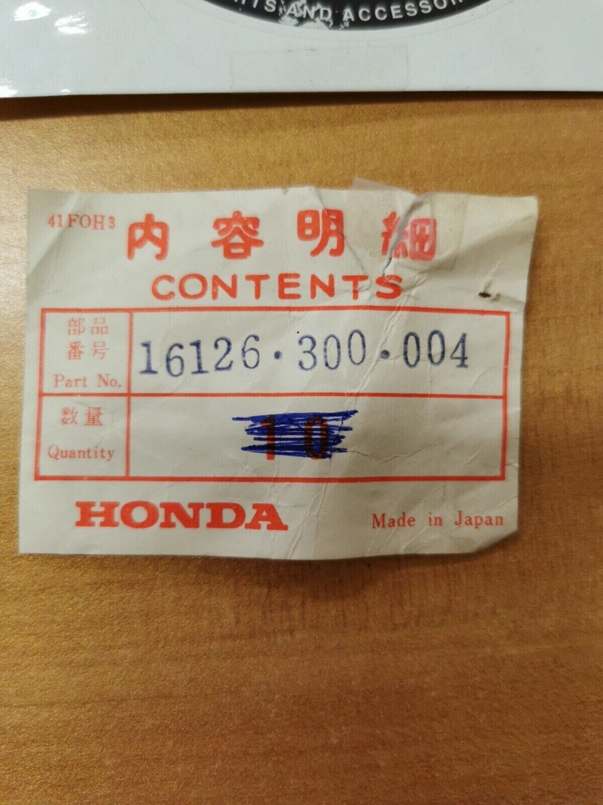 NOS Honda STOP SPRING 16126-300-004 H26
