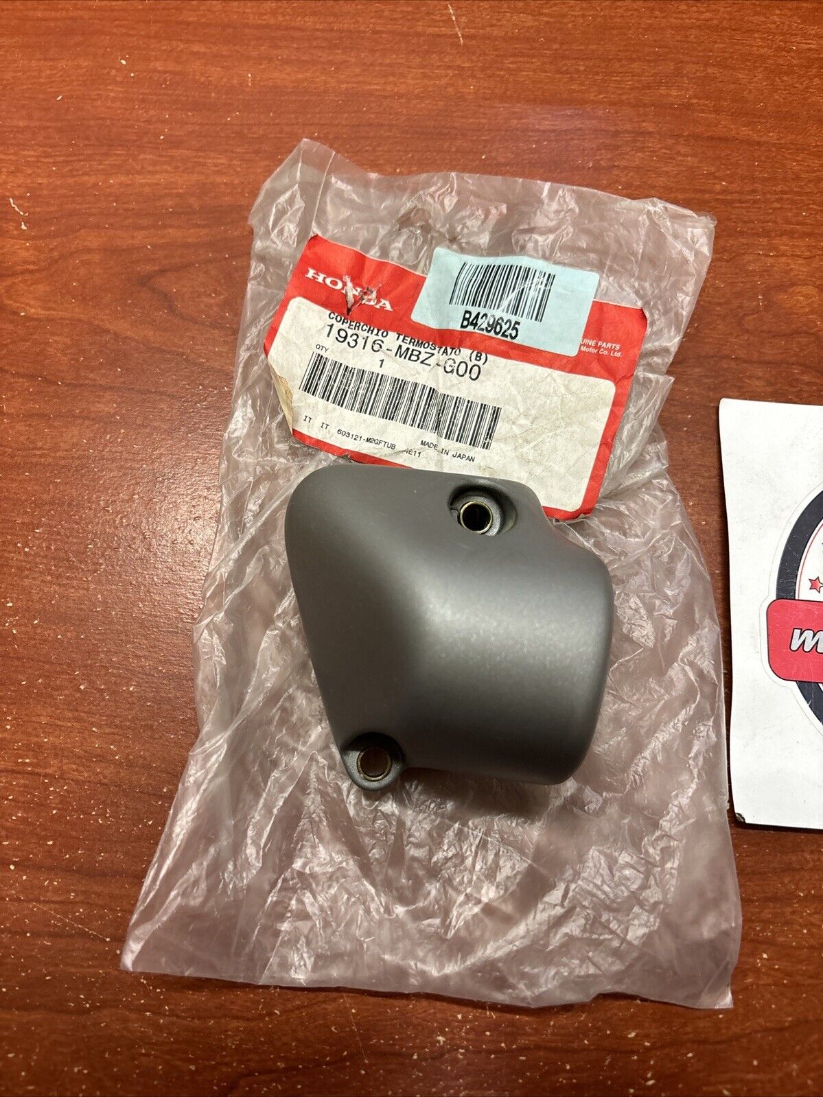 NOS Honda CB600F THERMOSTA COVER B 19316-MBZ-G00 H161
