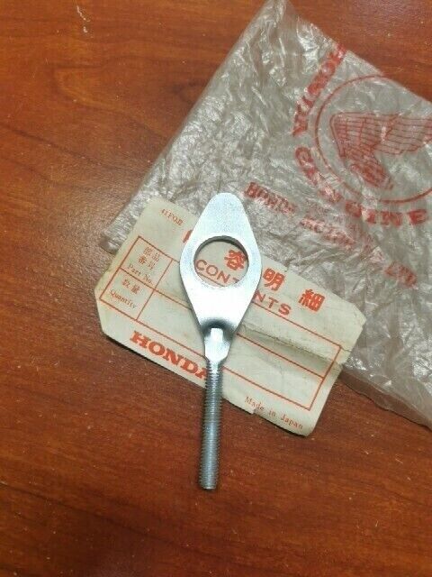 NOS Honda C100 C50 C70 LEFT CHAIN ADJUSTER 40544-035-000 SUB. 95014-10020 H69