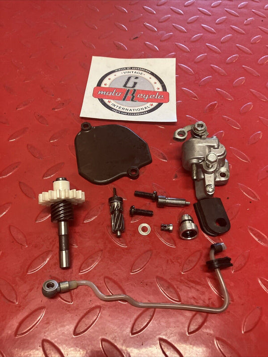 Honda MT125 1975 Complete oil pump assembly hose drive gear shaft 1974 1976