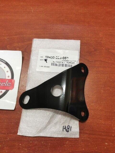NOS HONDA CB500 LEFT MUFFLER BRACKET B 18430-323-050 SUB 18430-323-040 H81