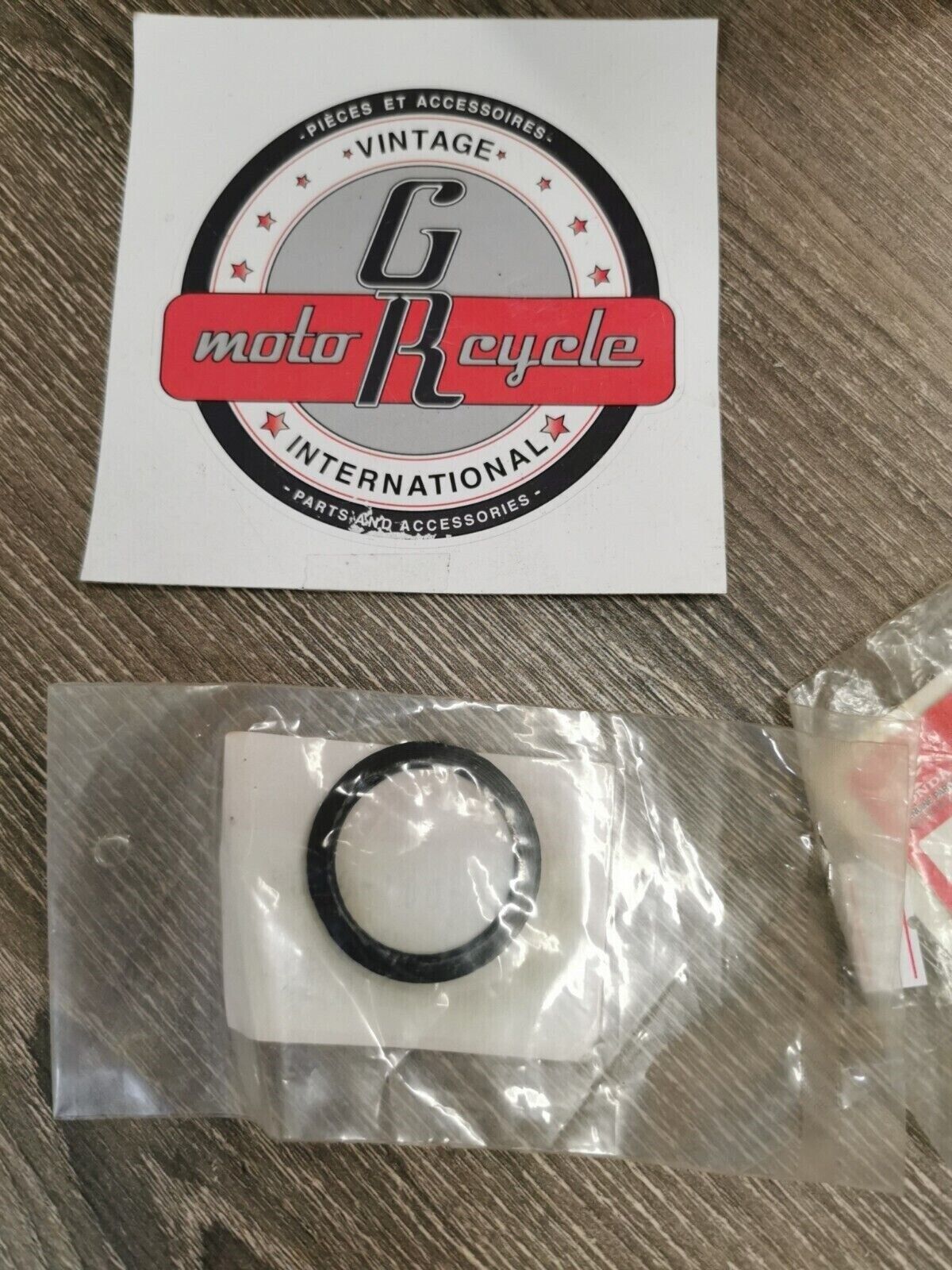 NOS HONDA  ATC125 DUST SEAL 53214-001-010  H57