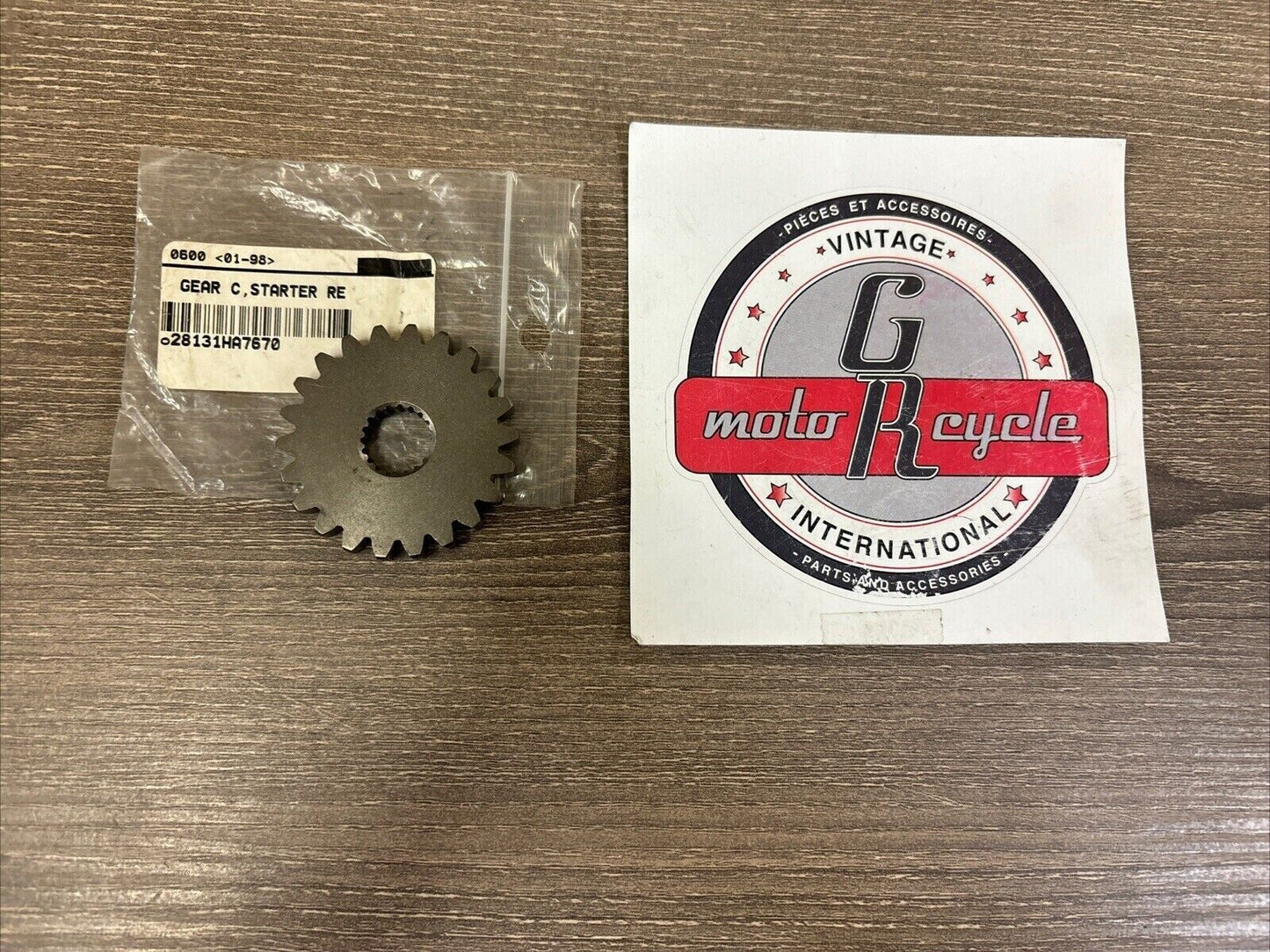 NOS Honda 1986 TRX350 STARTER REDUCTION GEAR C 22T 28131-HA7-670 H118
