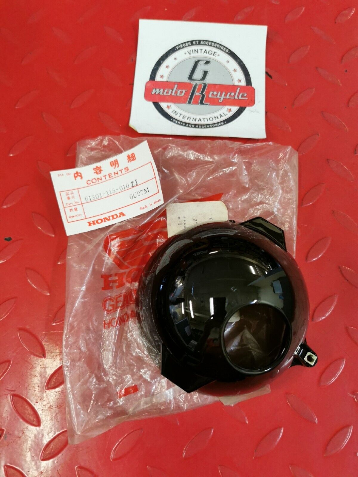 NEW NOS HONDA Z50A 1976 - 1978  CASE HEADLIGHT NH1 61301-115-010ZJ  H39