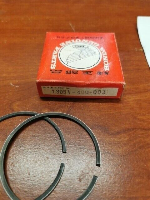 NOS Honda 1976 1977 1978 CR125M PISTON RING SET (1.00) 13051-400-003 H75
