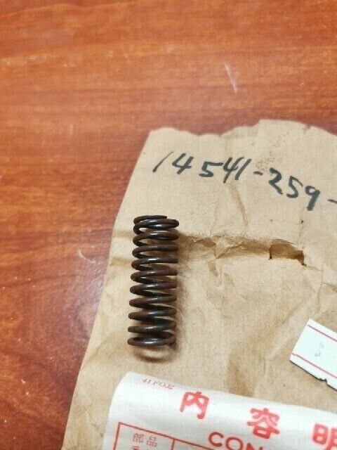 NOS Honda C72 C77 C78 CA72 CA77 CAM CHAIN TENSIONER SPRING 14541-259-000 H93
