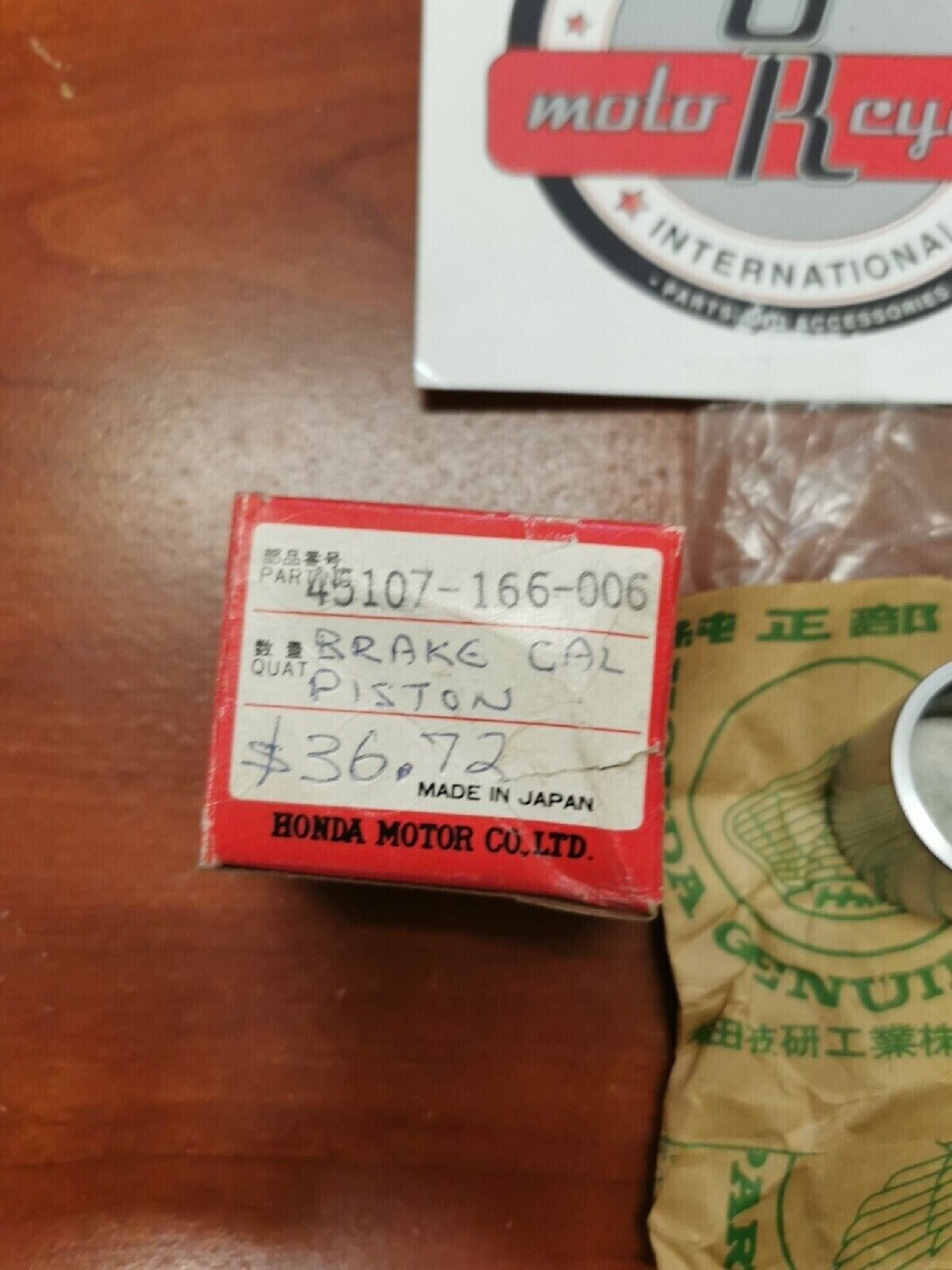 NOS Honda CR80 CRF150 CR85 BRAKE CALIPER PISTON 45107-166-006 H34