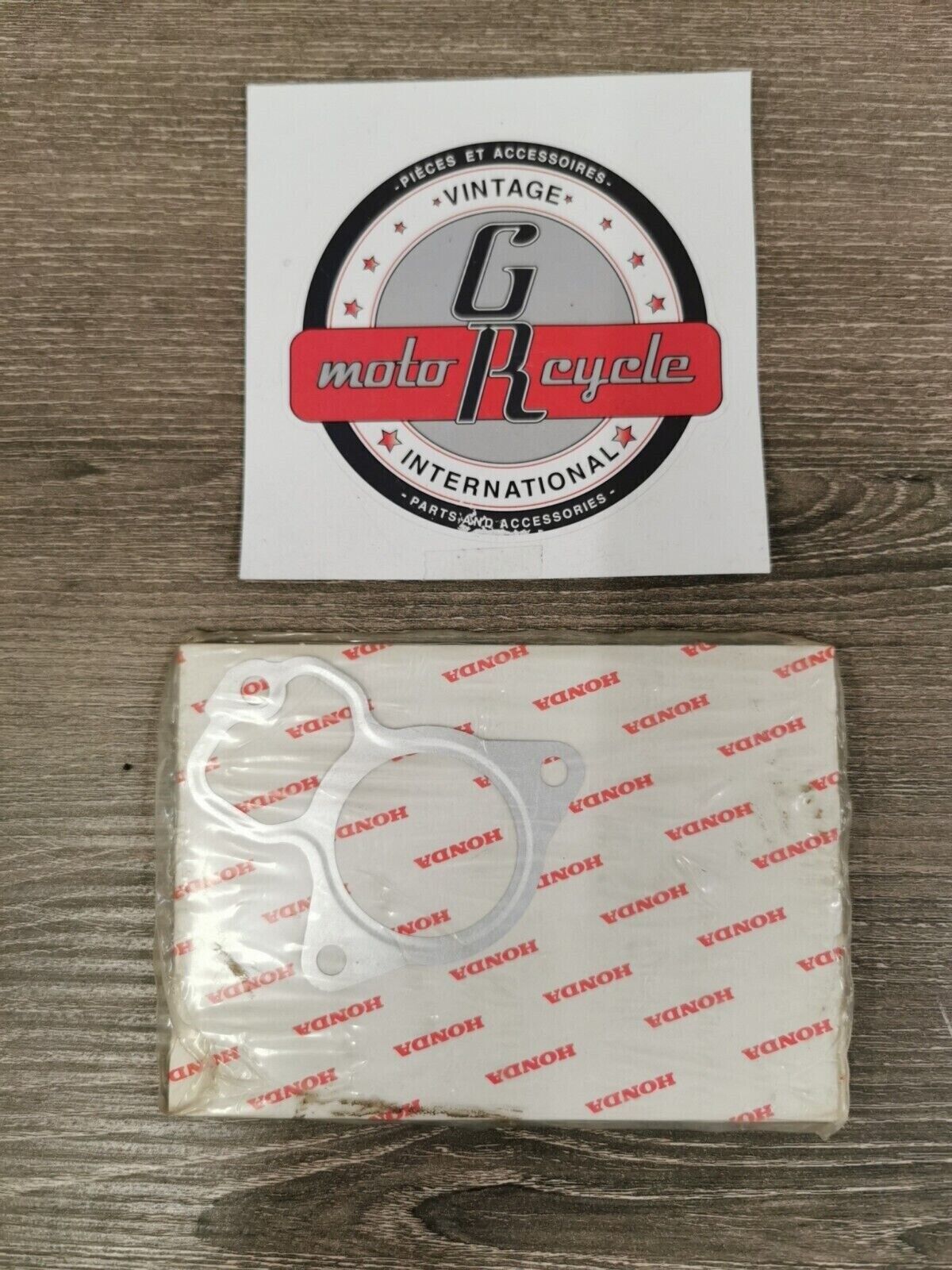 NOS HONDA CR125R 1987 1988 GASKET EX JOINT 18314-KS6-701 H49