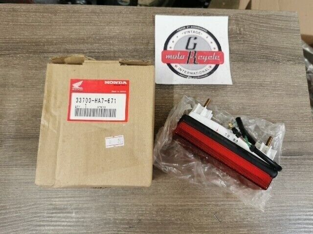 NOS HONDA TRX350 1986 - 1989 TAIL LIGHT ASSY 33700-HA7-671 H101