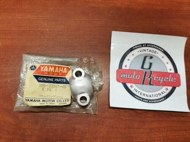 NOS Yamaha RD250 RD350 RD400 TX500 XS2 XS500 AXLE HOLDER 306-23167-60-00 Y129